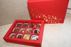 Weihnachtsbox rot - gold mit 12 Pralinen